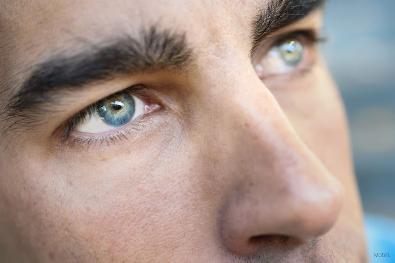 Close up of man's blue eyes